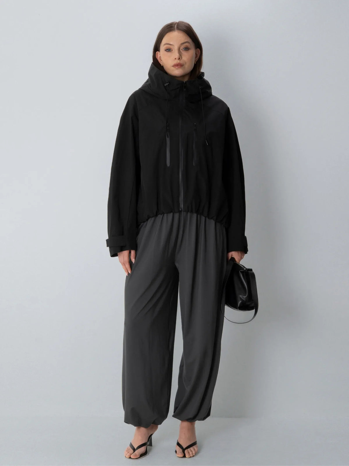 Kort oversized regnjakke i sort
