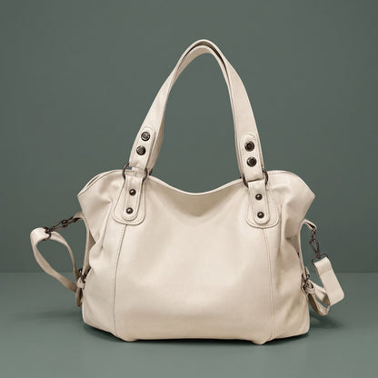Lys beige hobo bag med nitter og aftagelig skulderrem